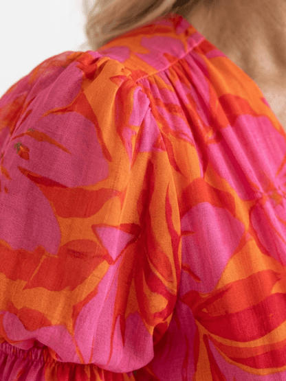 Andromeda | Vestido midi floral con escote en V y mangas abullonadas - VENZA BARCELONA