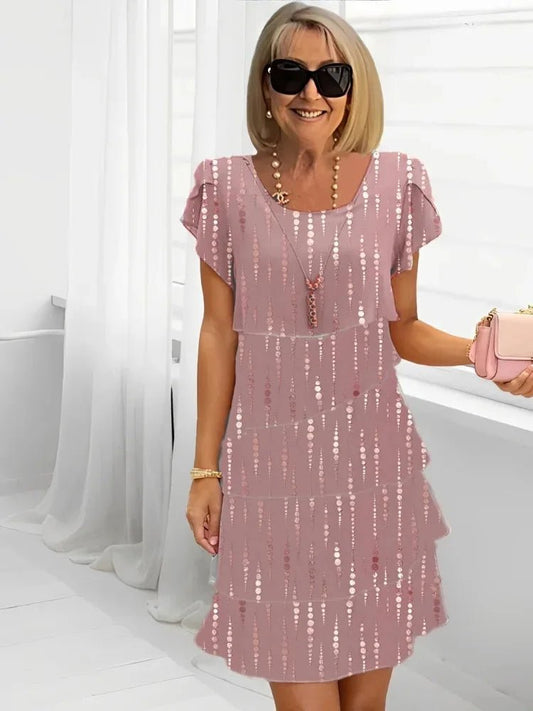 Livia – Vestido elegante fluido con volantes - VENZA BARCELONA